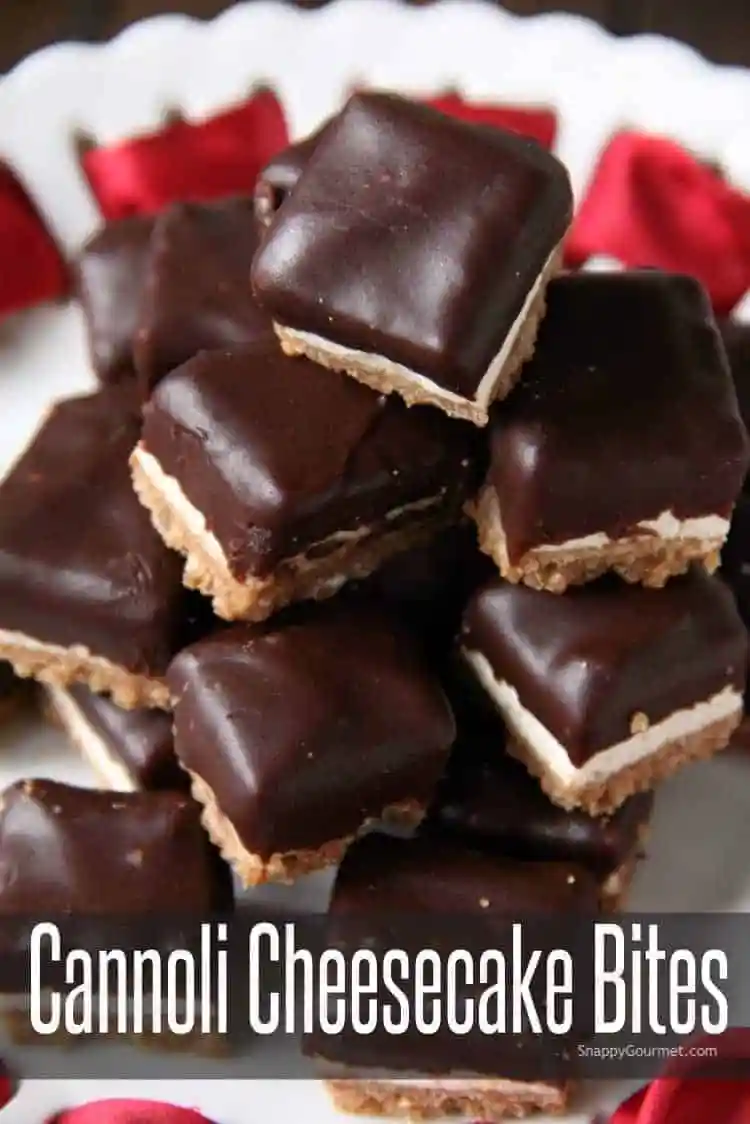 Stack of chocolate covered cheesecake bites.