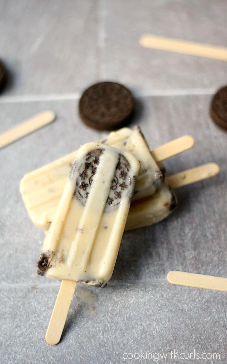 Stack of cookies and cream popsicles.