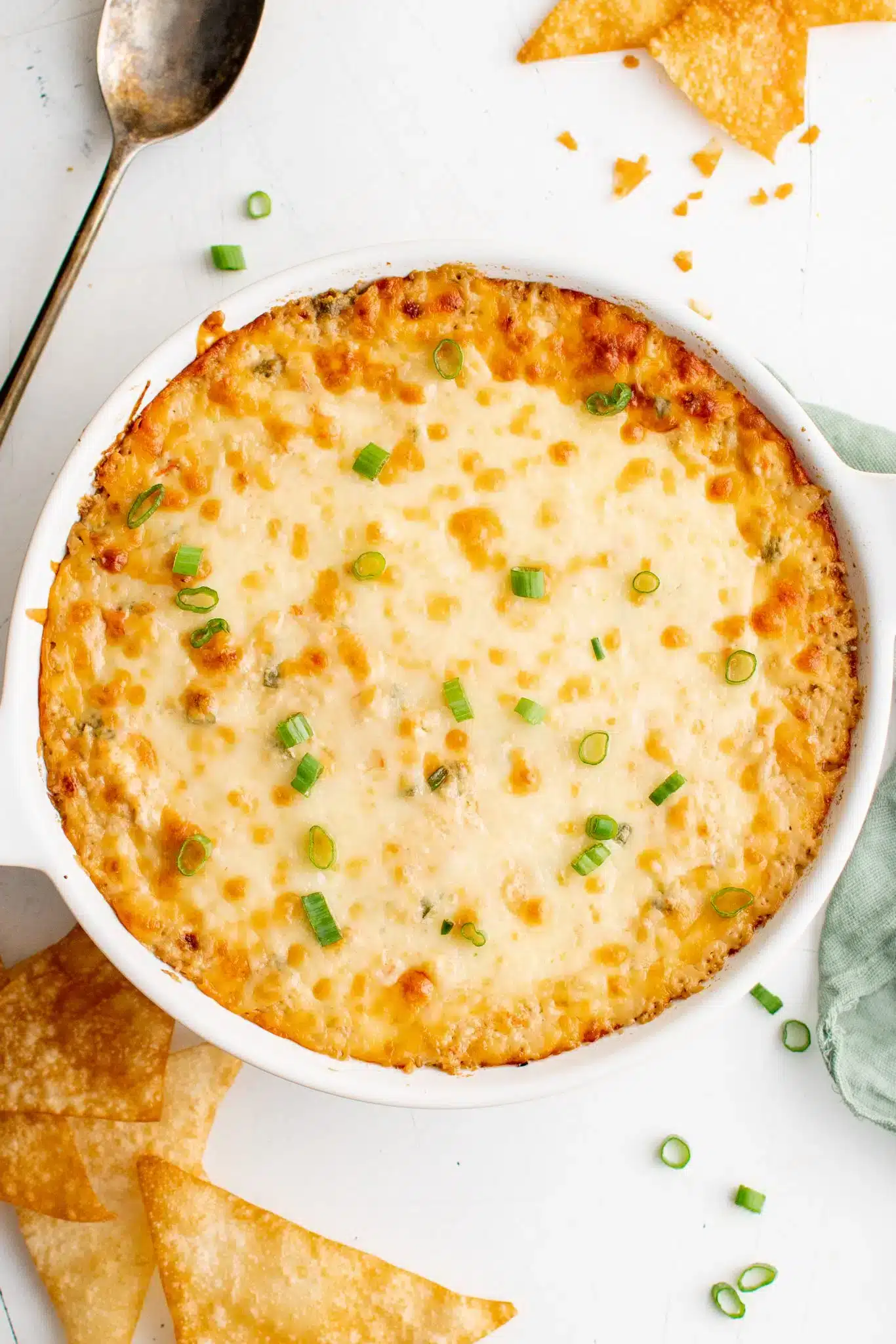 Crab rangoon dip in a white dish.