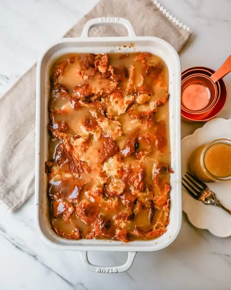 Baking dish filled with croissant bread pudding.