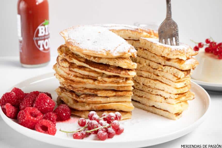 Large stack of ricotta pancakes.