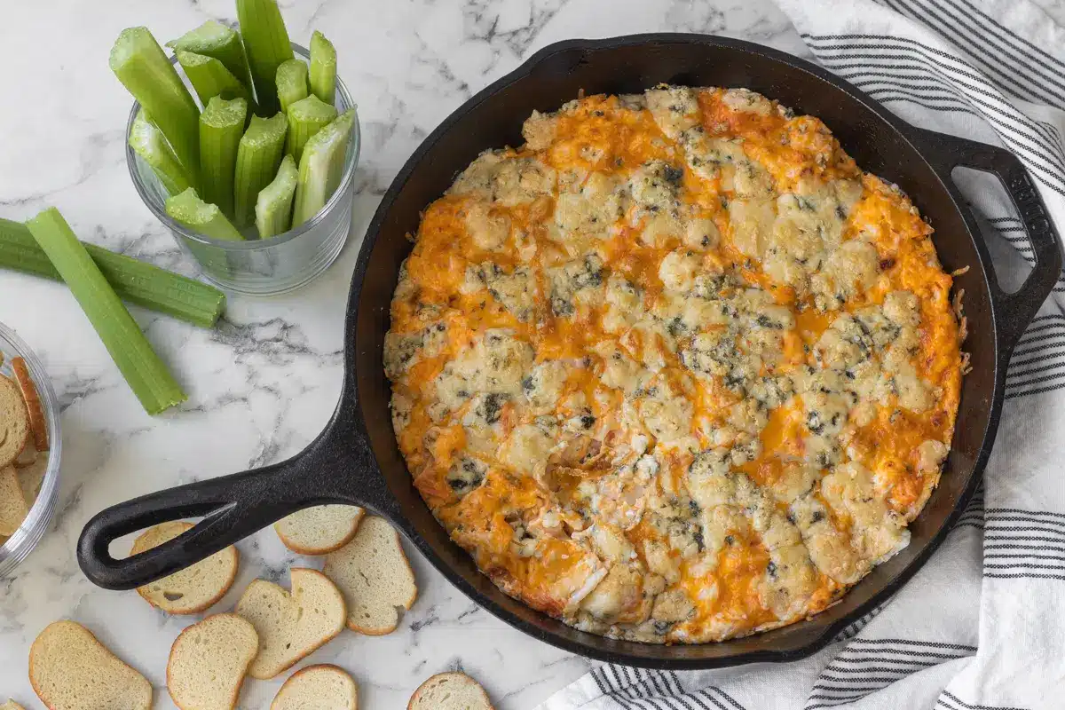 Buffalo crab dip in a cast iron.