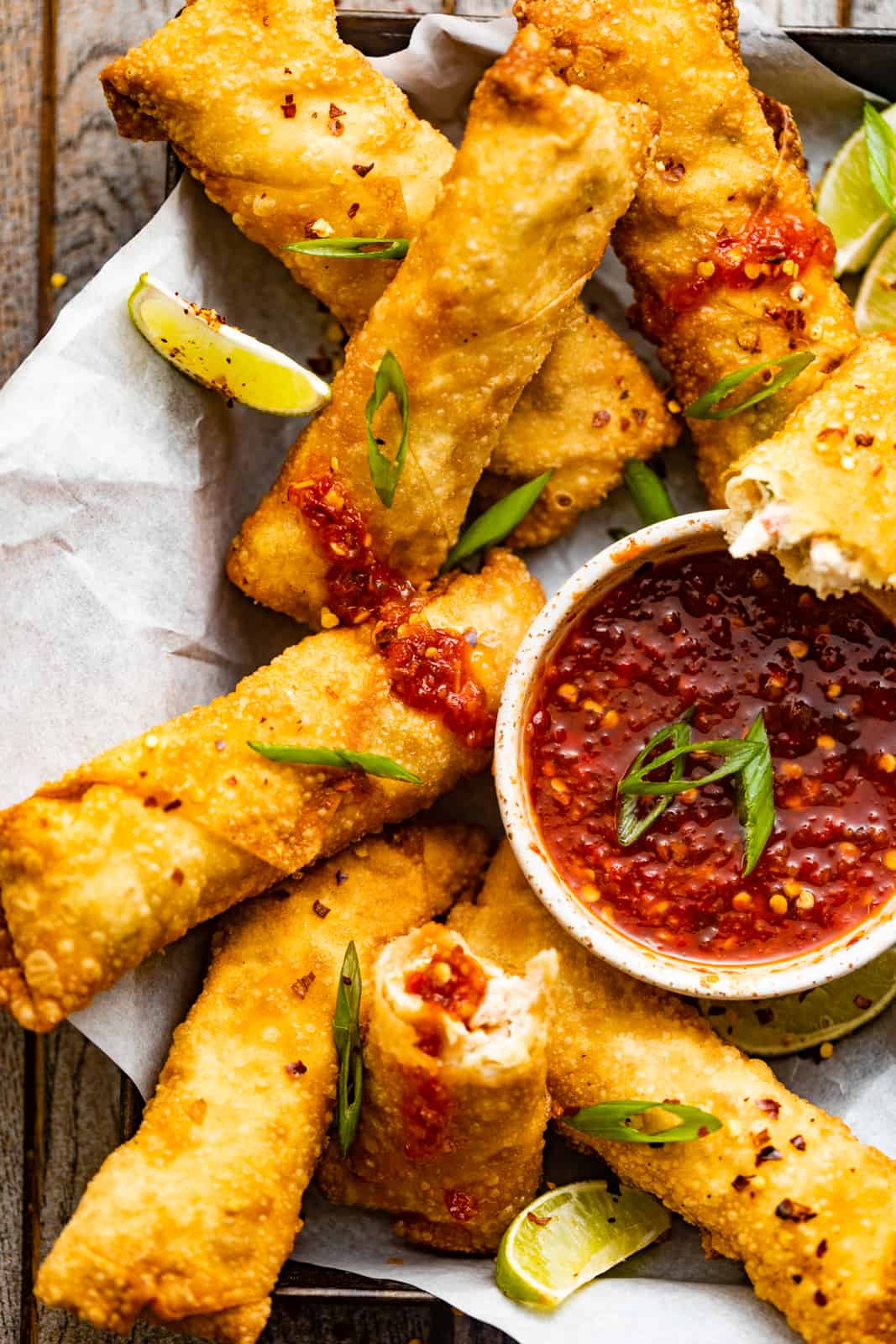 Stack of crab rangoon egg rolls.