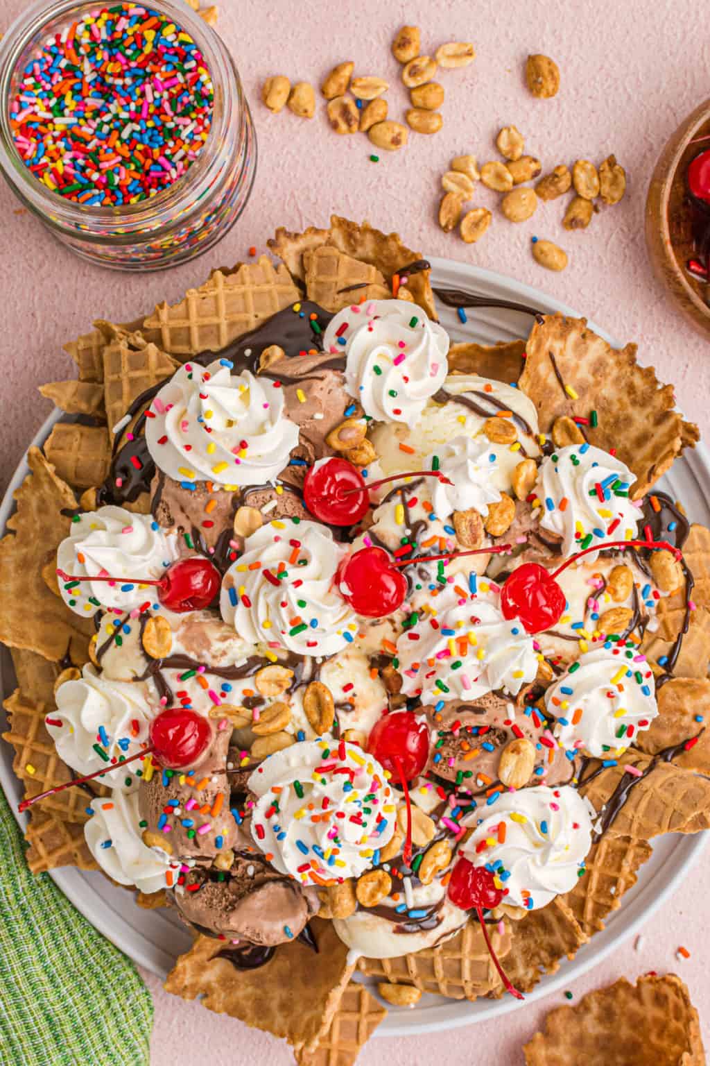 Overhead shot of ice cream nachos with lots of toppings.