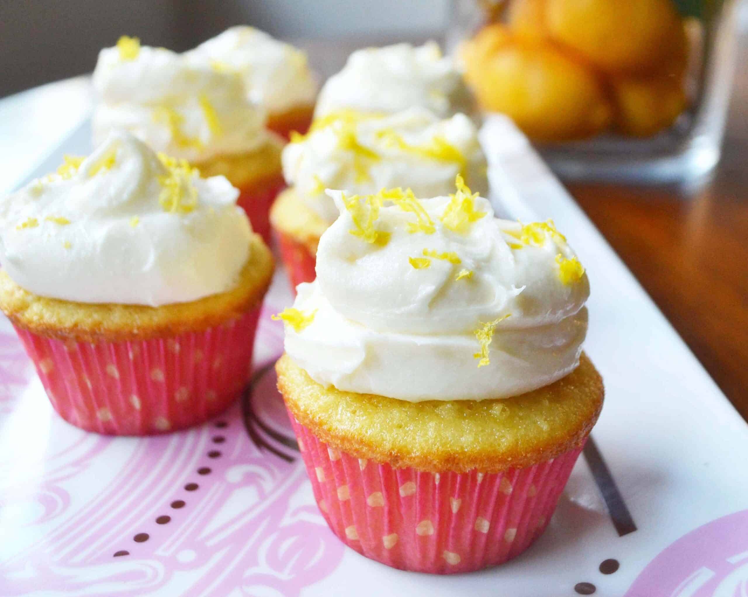 Italian lemon cupcakes on a square plate.