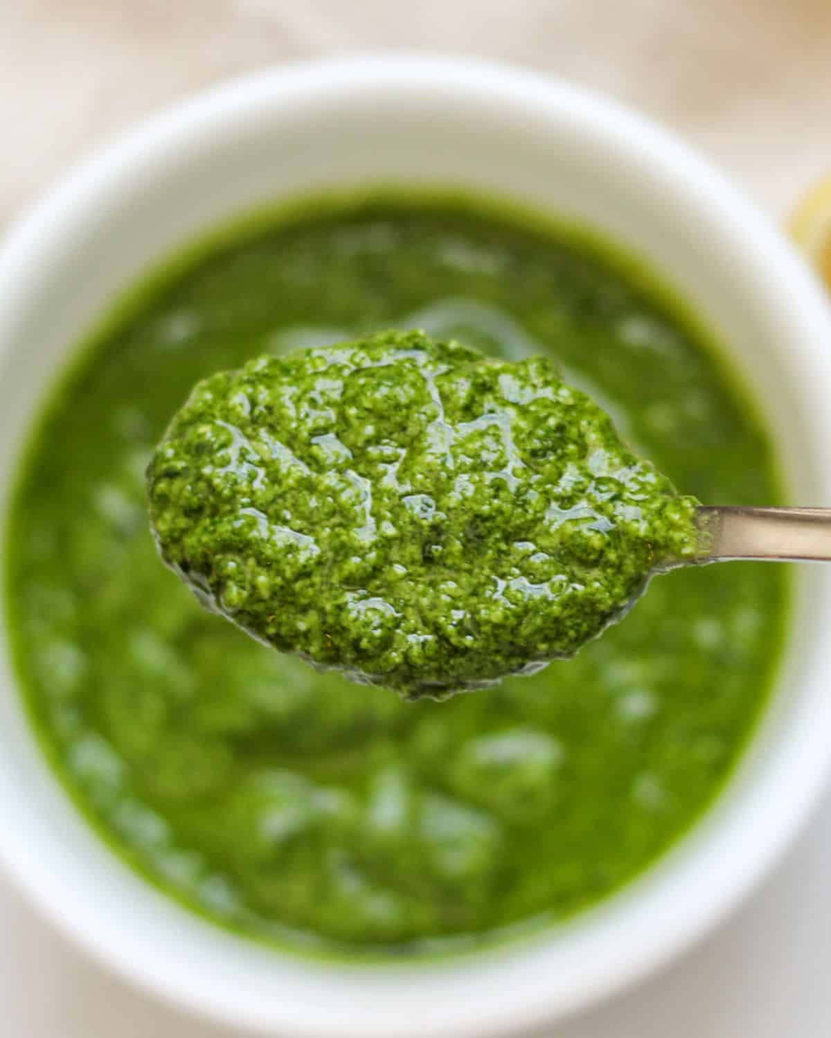 Lemon pesto in a bowl with a spoon.