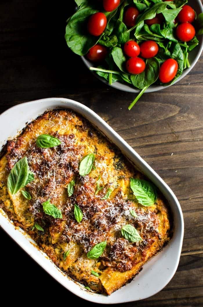 Beef cannelloni in a white backing dish.