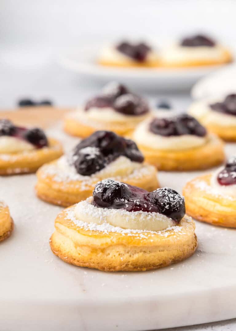 Crescent roll Danish on a marble surface.