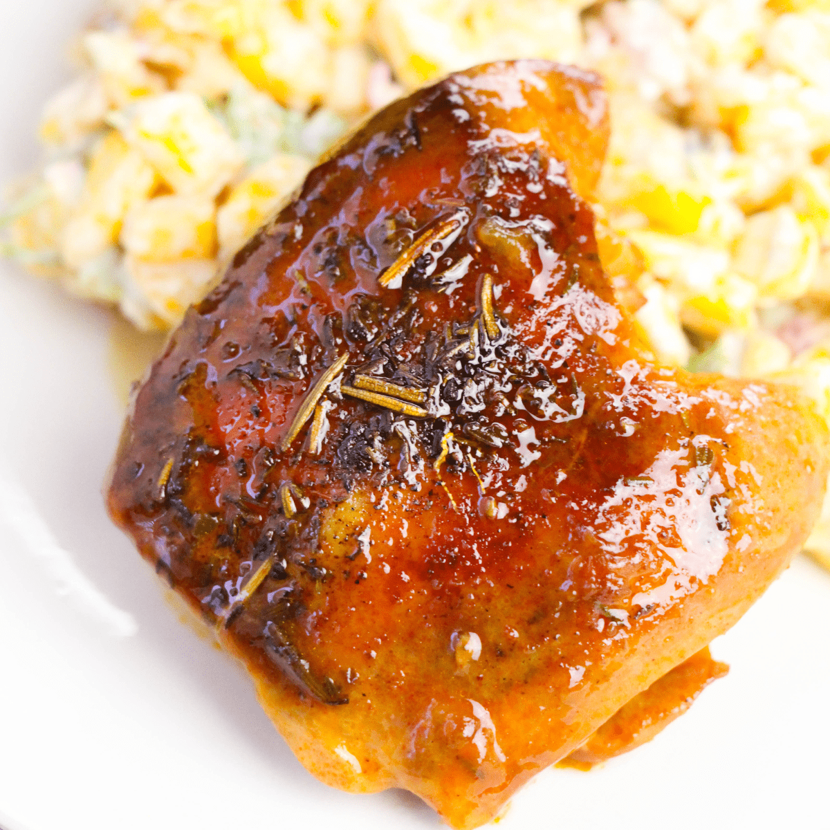 Close up of bbq peach chicken thighs.