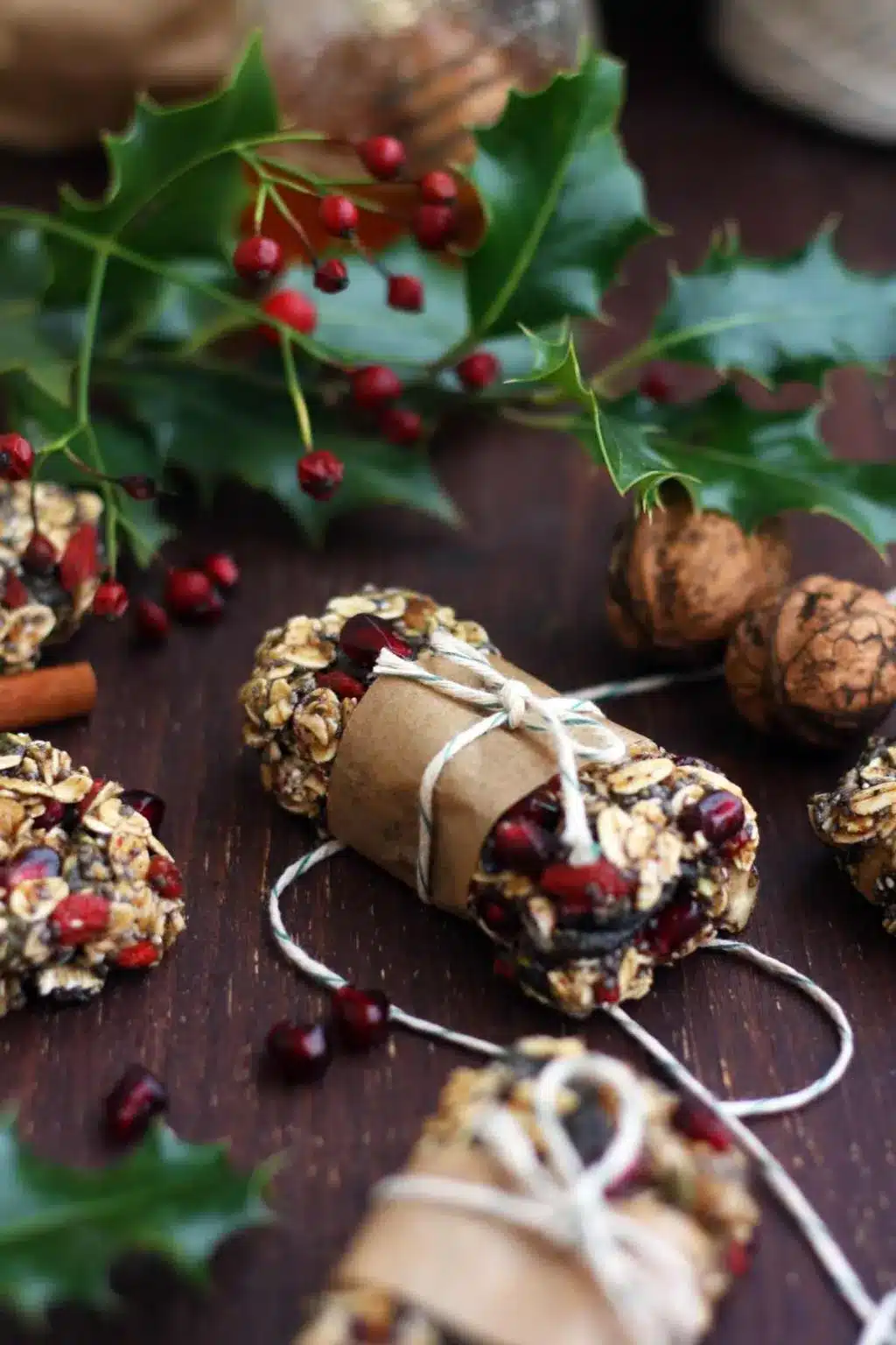 Healthy chewy granola bars on a dark surface.