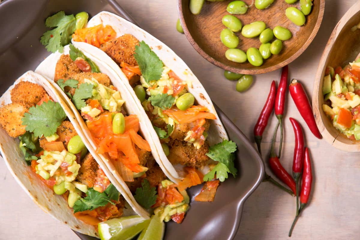 Kimchi tacos with edamame and other ingredients.