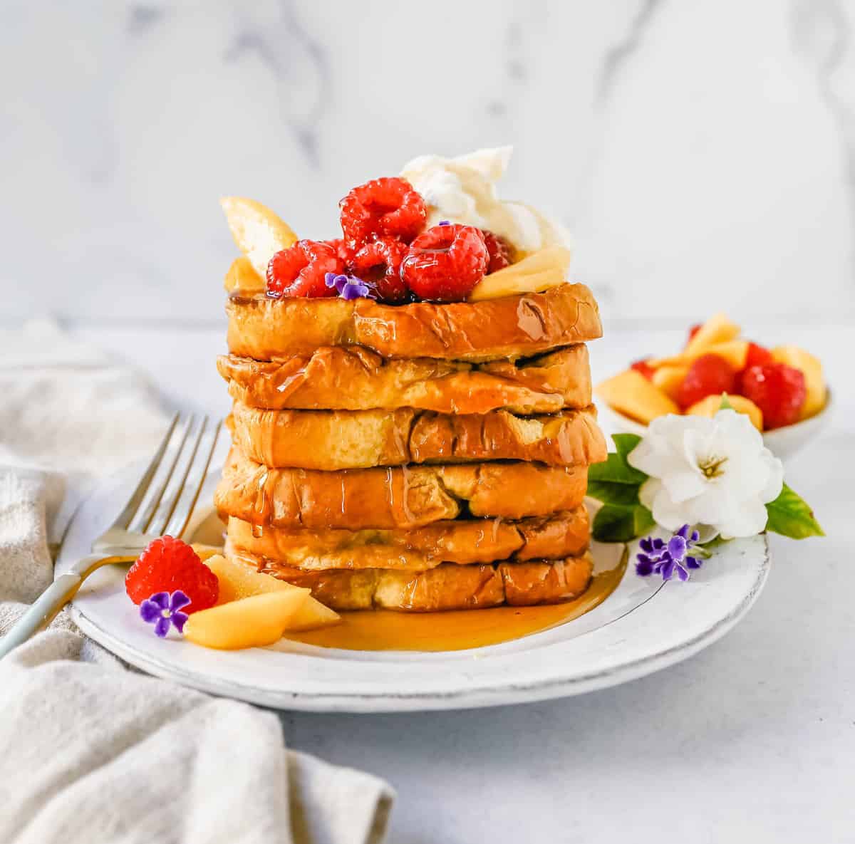 Stack of brioche sheet pan French toast.