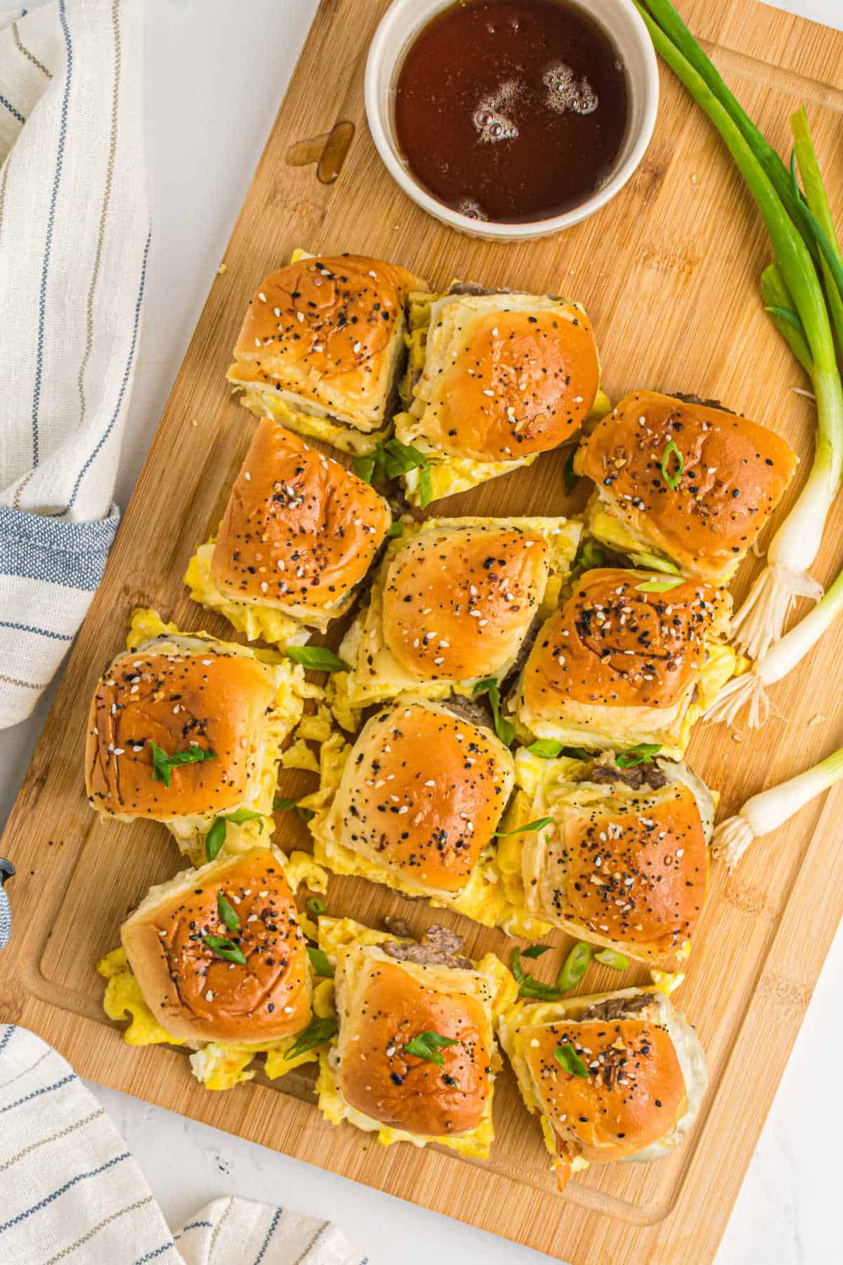 Breakfast sliders on a cutting board.