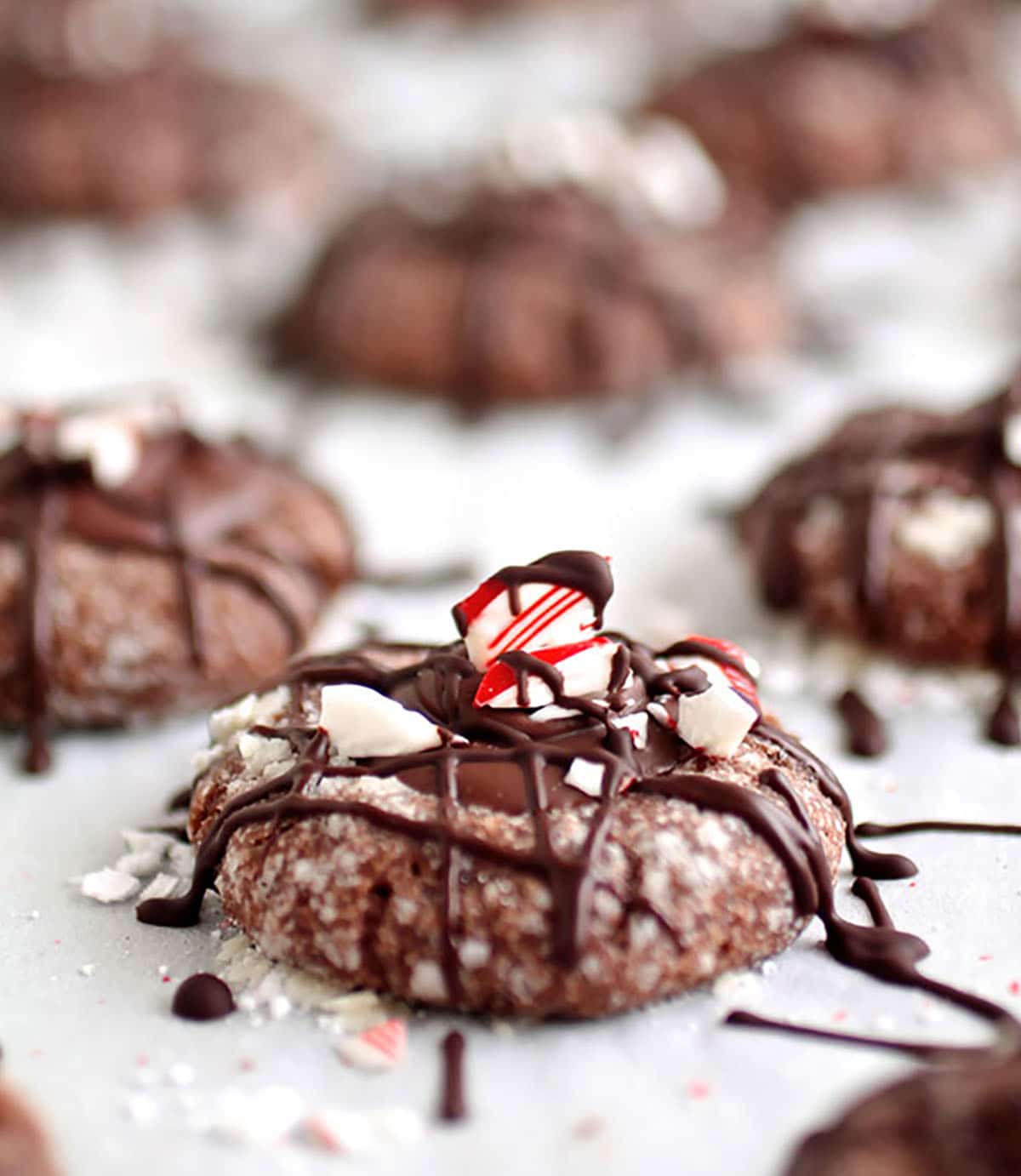 Closeup of chocolate peppermint thumbprint cookies