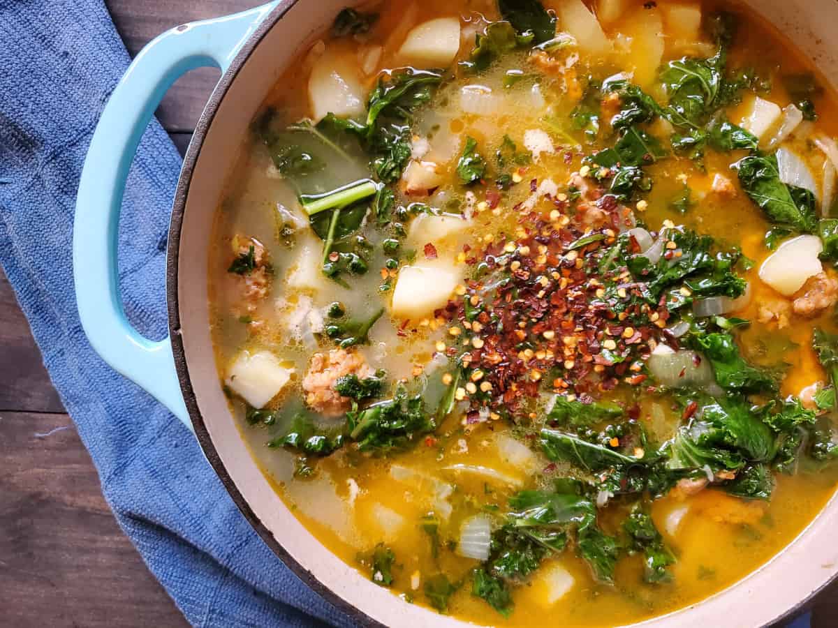 Zuppa Toscana soup in a Dutch oven.