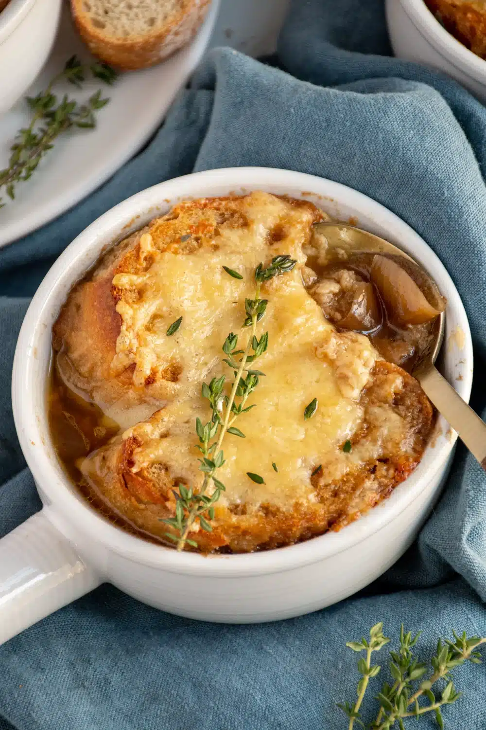 French onion soup in a white bowl.