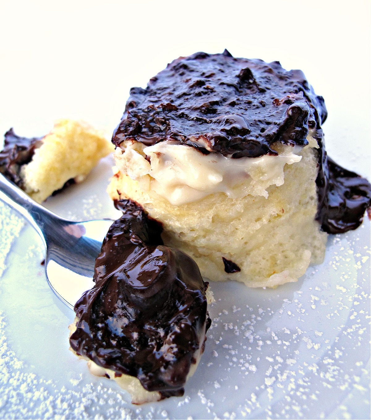 Boston mug cake with a fork up close.