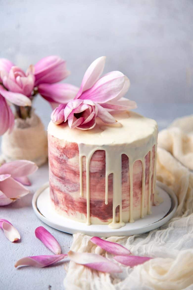 Ginger cardamom cake on a white plate.