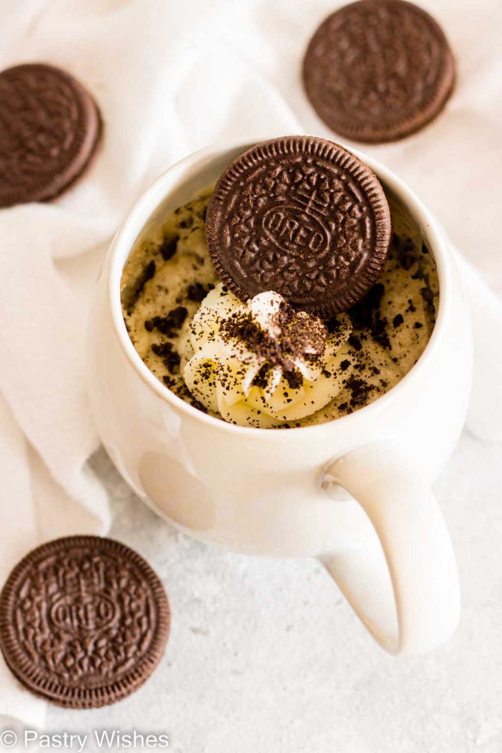 Oreo mug cake with whole Oreos.