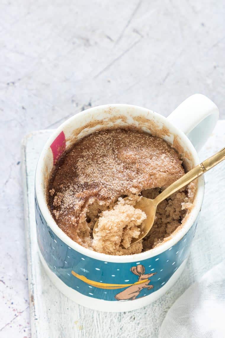 Snickerdoodle mug cake in a decorative mug.