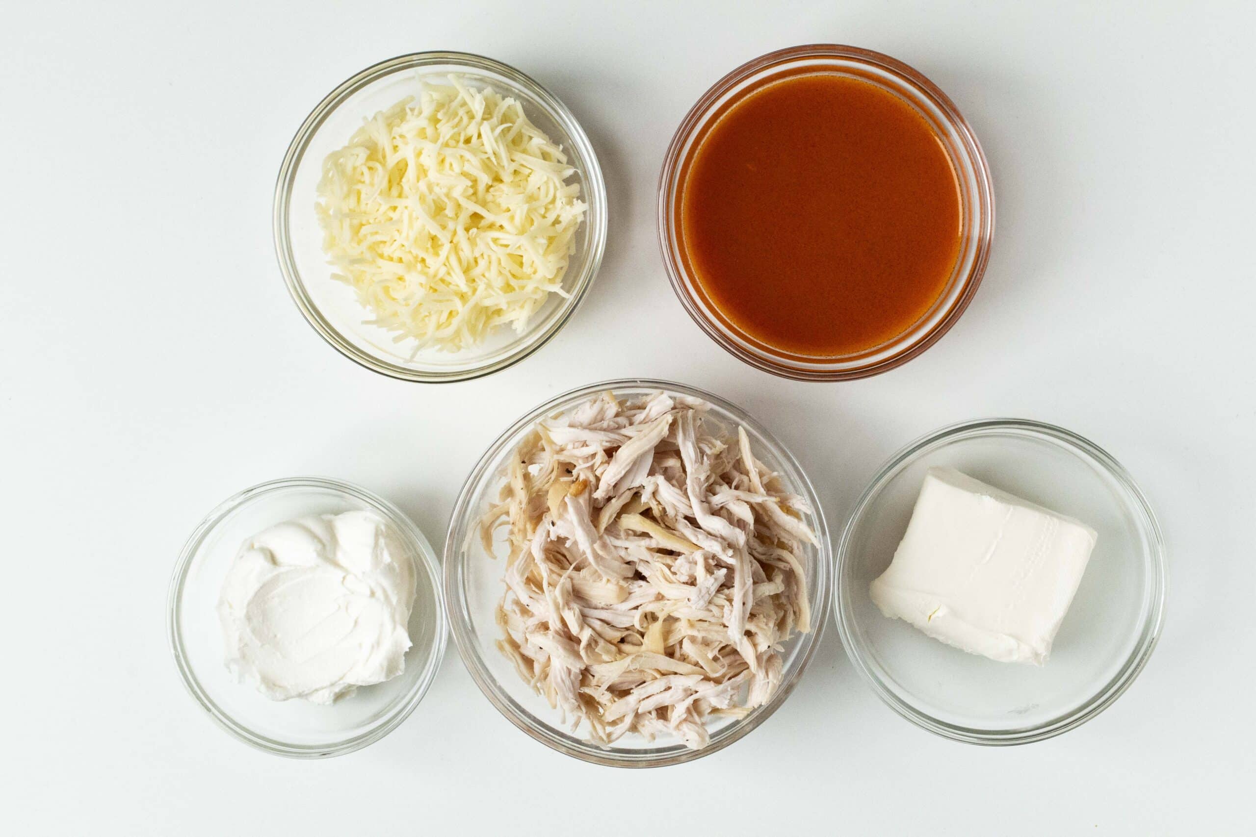 Ingredients for air fryer buffalo chicken dip.