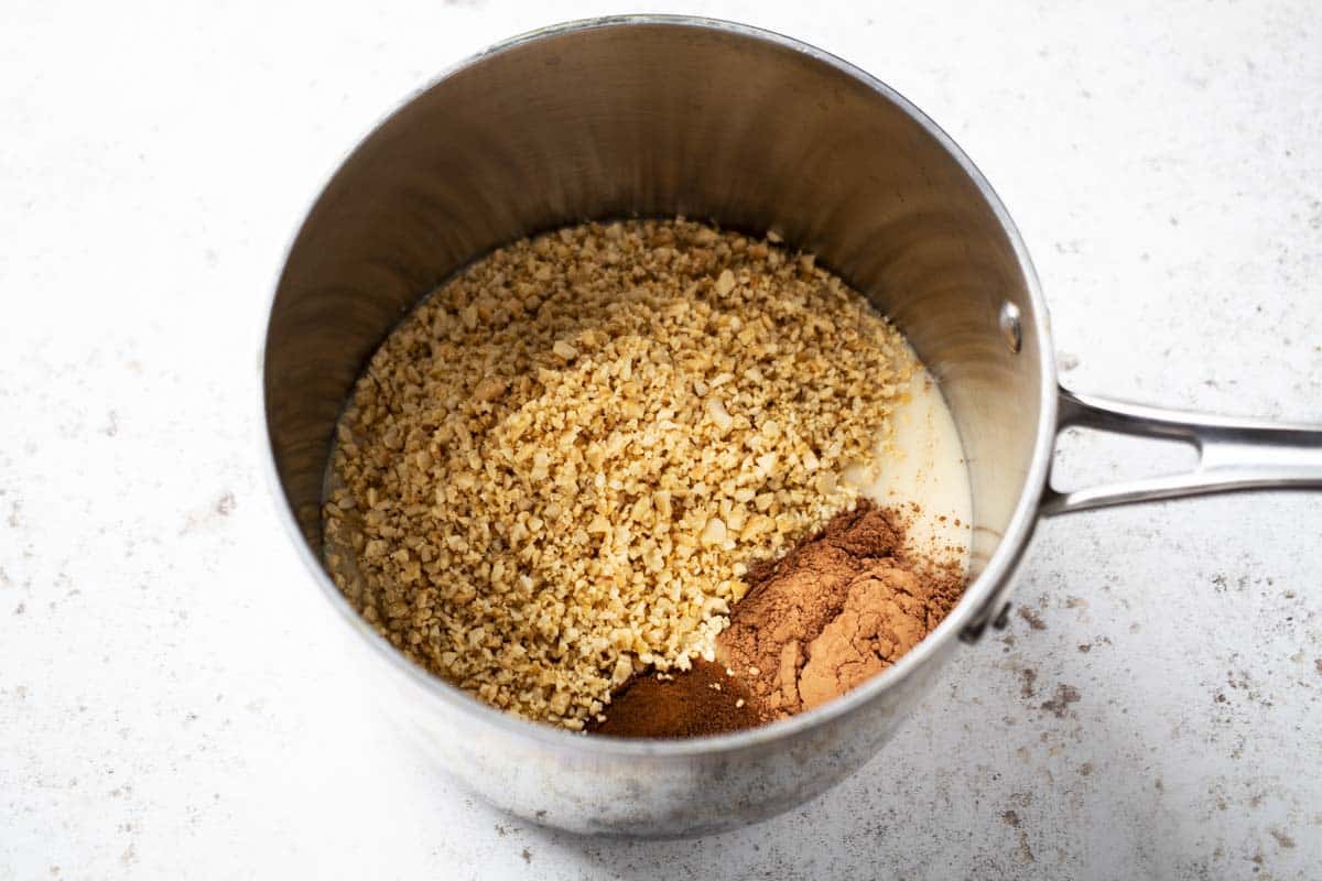 Peanut ball ingredients in a sauce pan.