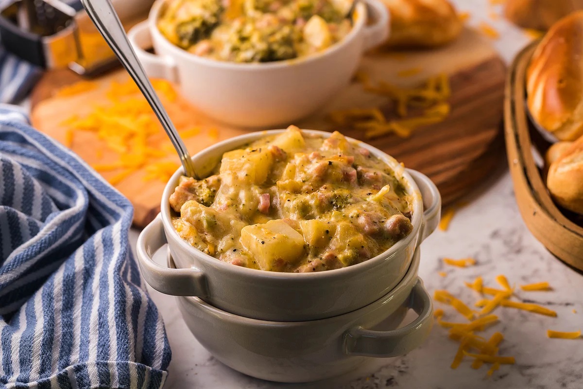 Slow cooker chunky ham, potato, cheese, and broccoli soup.