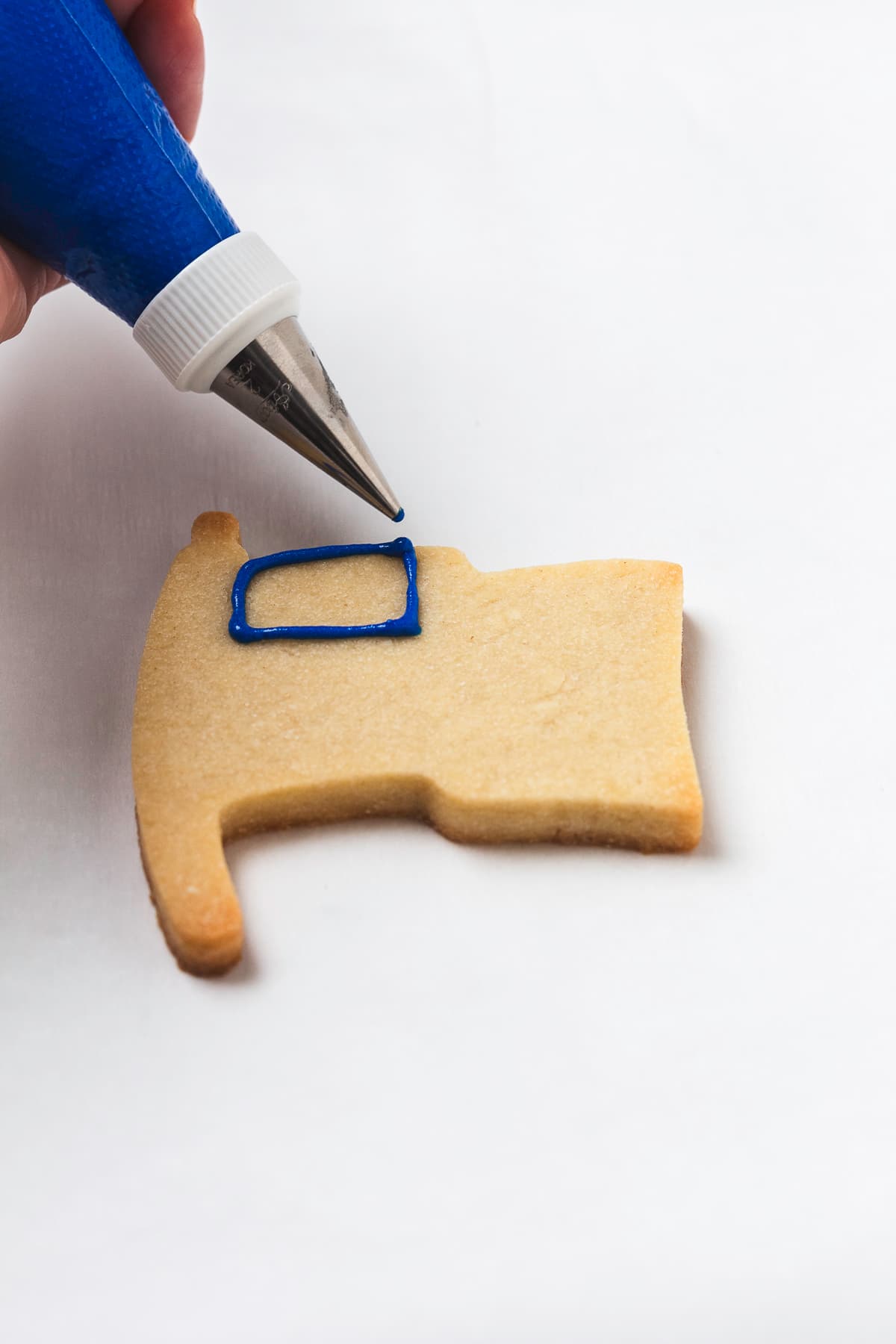Drawing the canton for American flag with royal icing.