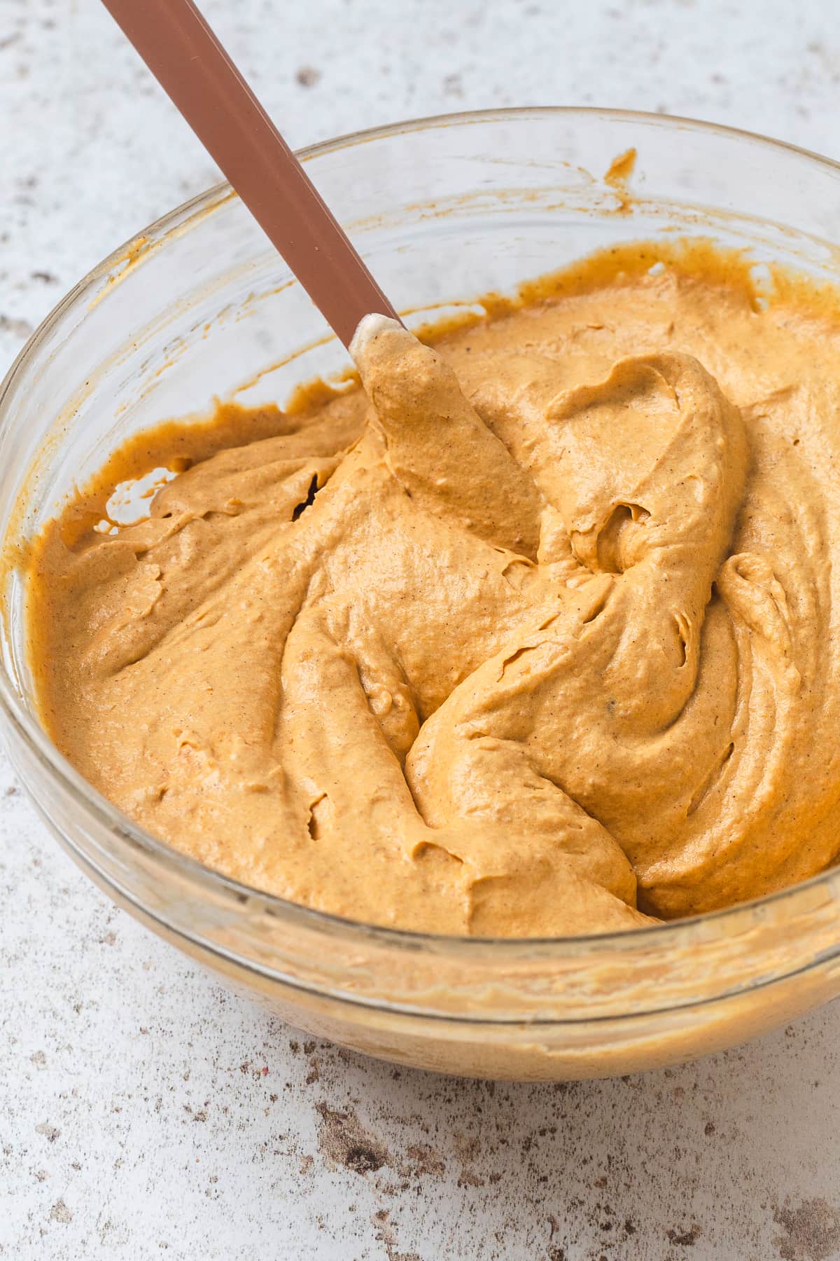 Mixed pumpkin spice latte dip in a clear bowl.
