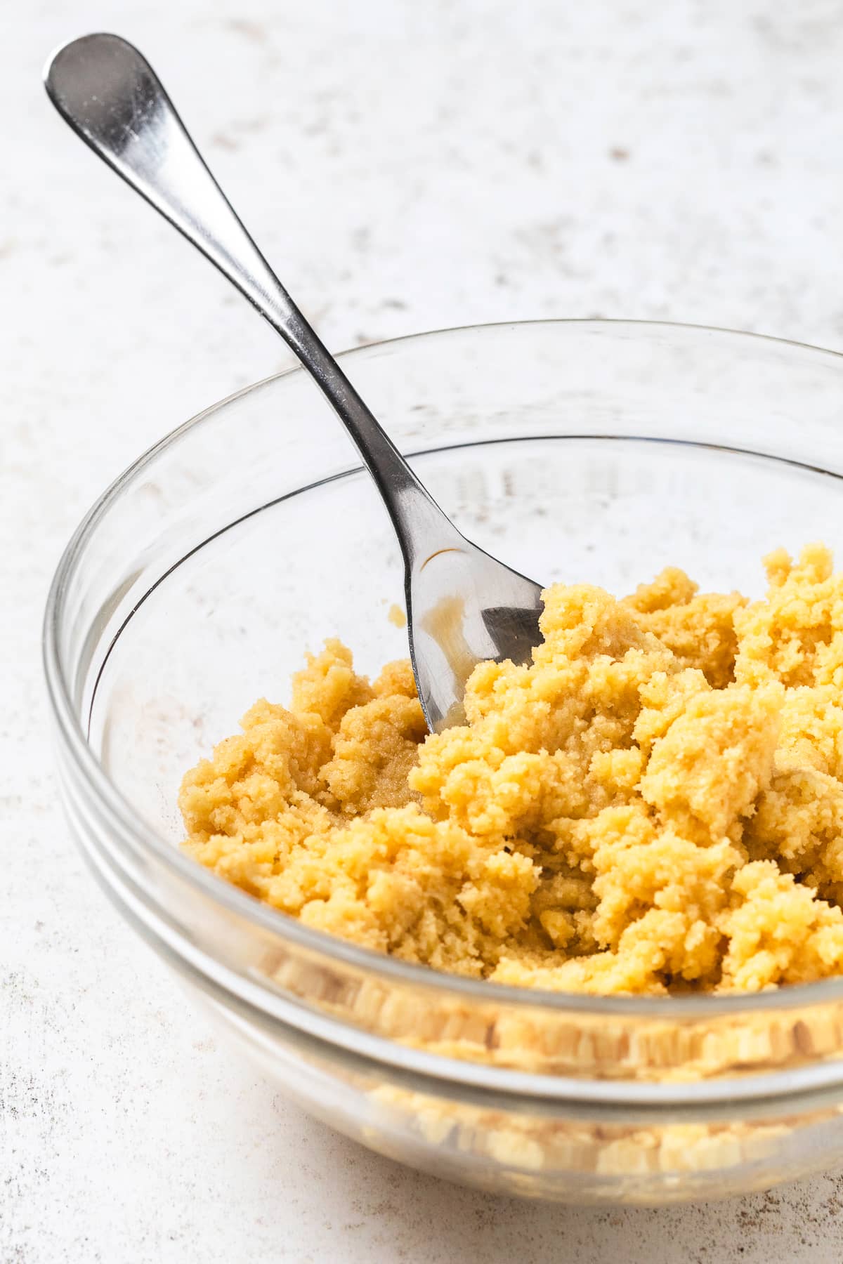 Combined cake pop mixture in a clear bowl.