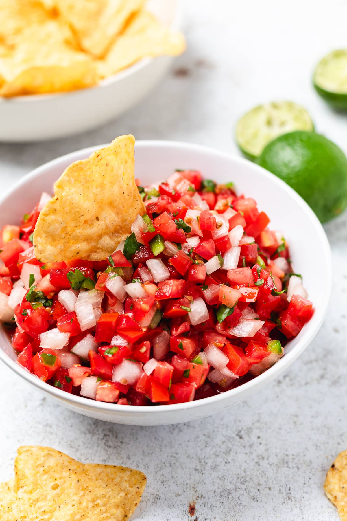 Pico de gallo with diced tomatoes, onion, cilantro, and lime served with tortilla chips.
