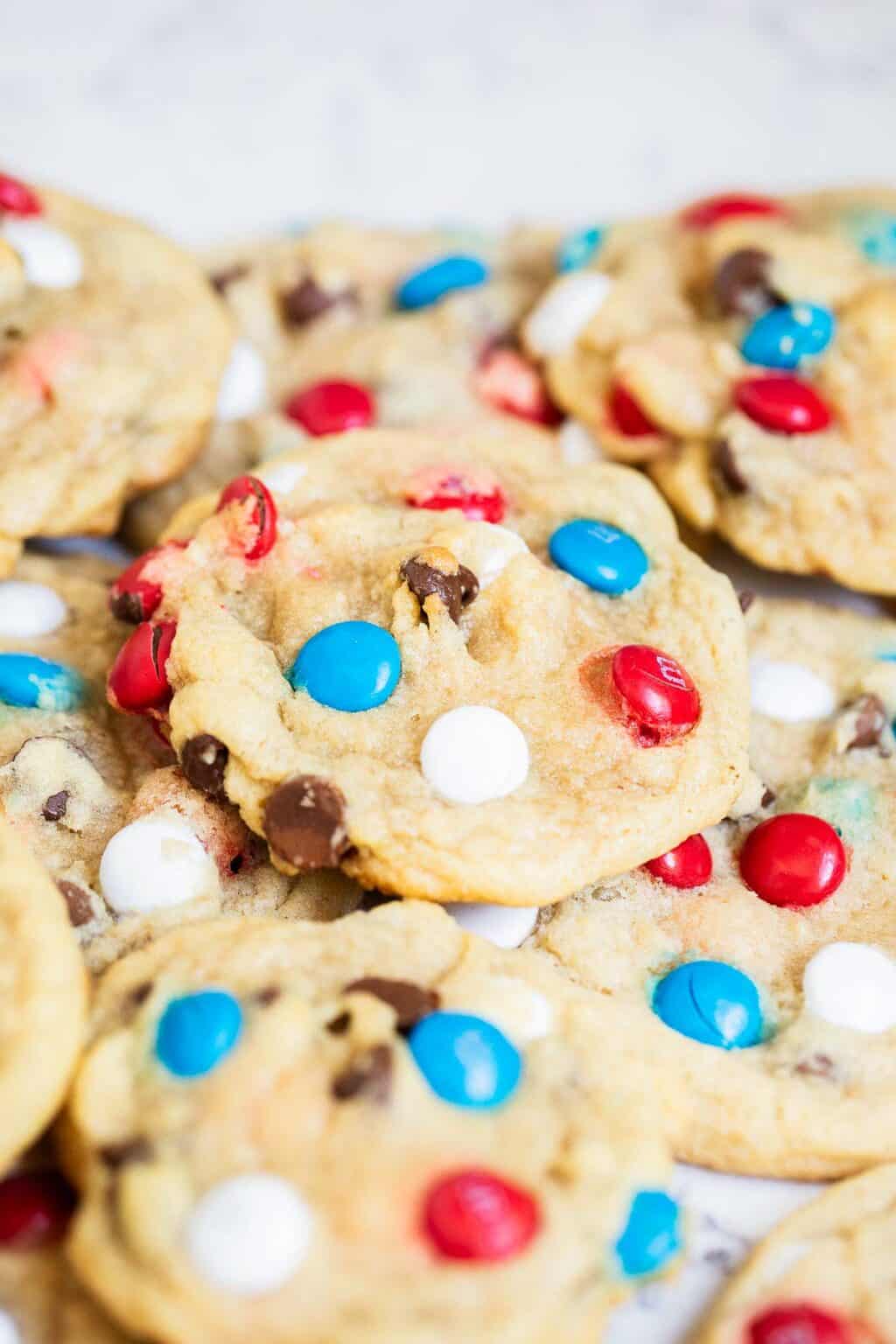 Soft baked cookies with red, white, and blue candies and chocolate chips.