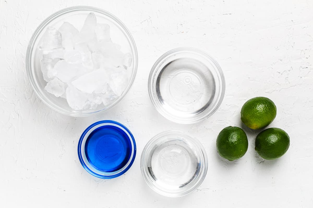 Ingredients for frozen blue margarita with curacao.