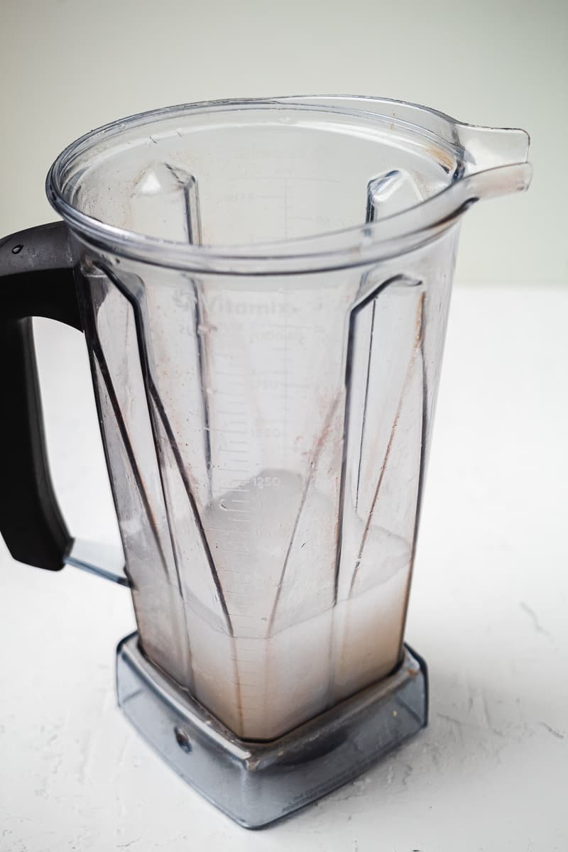 Frozen white margarita blended in a blender pitcher.