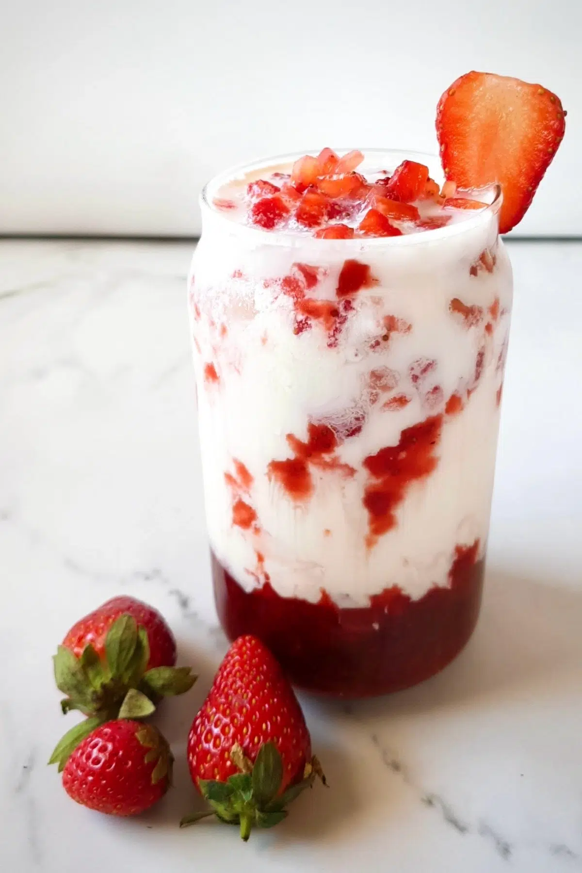 Korean strawberry milk with fresh strawberries and cream.