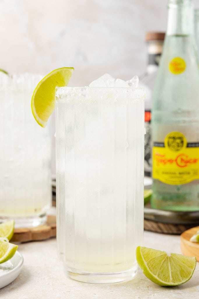 Ranch water cocktail with lime and sparkling water over ice.