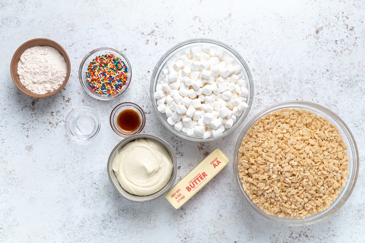 Ingredients for Birthday Cake Rice Krispie treats on a countertop.