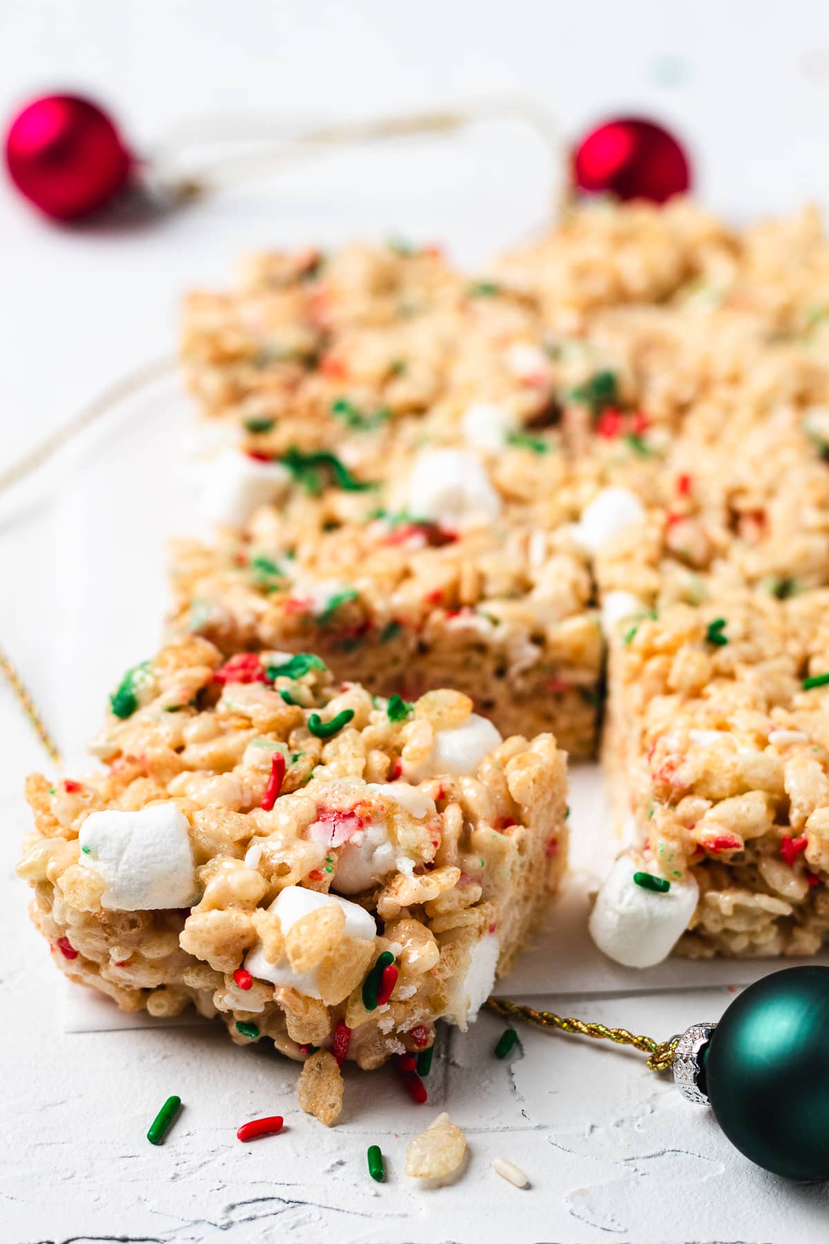 Christmas sugar cookie Rice Krispie treats on a platter.