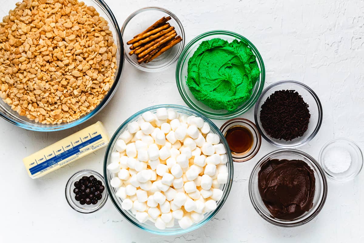 Ingredients for Frankenstein Rice Krispie treats arranged on a countertop.