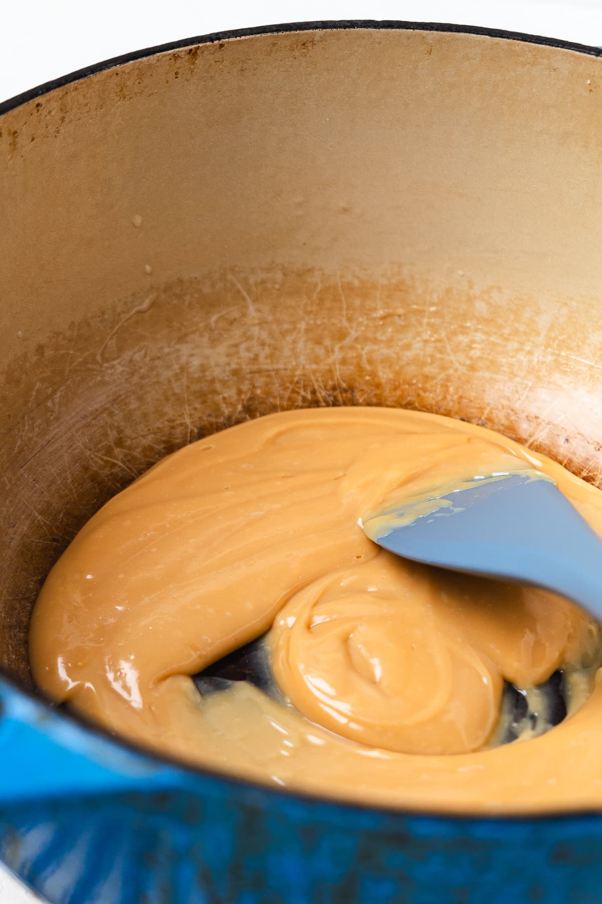 Melted caramel mixture in a Dutch oven.