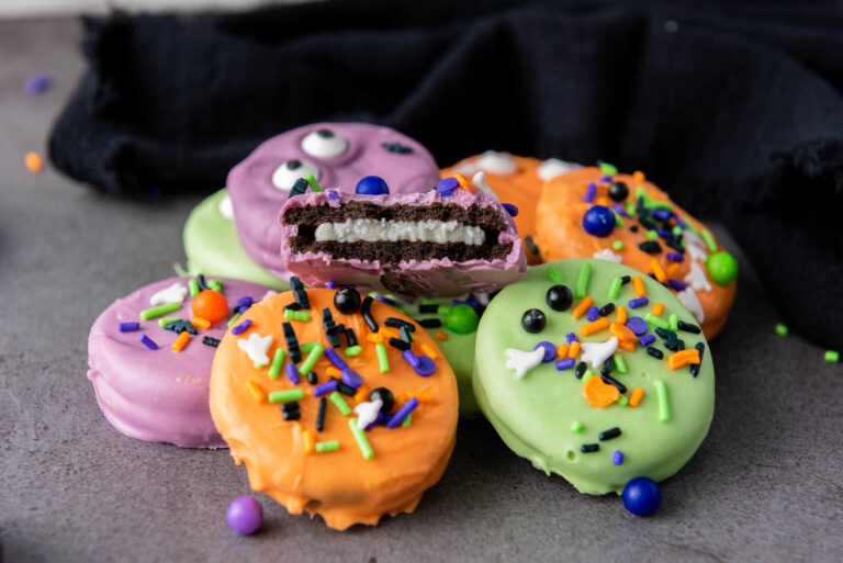 Colorful Halloween Oreos dipped in candy melts.