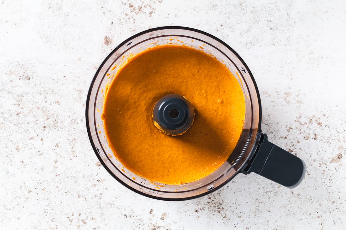1. Smooth pumpkin cheesecake filling blended in a food processor.